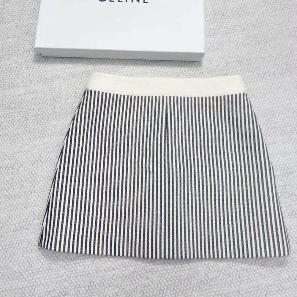 Back angle displaying signature hardware on Celine Women Trapeze Mini Skirt