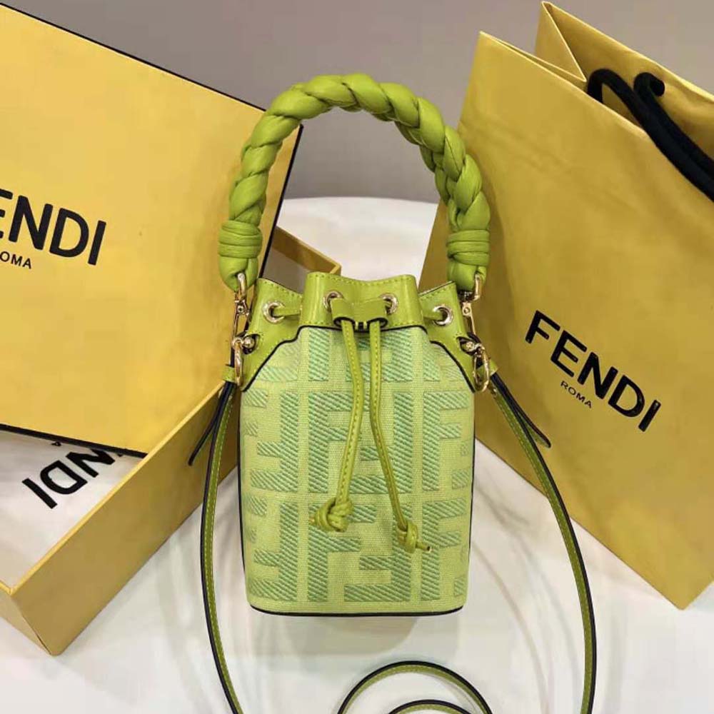 Close-up of silver FF logo charm on Fendi Women Mon Tresor mini-bag