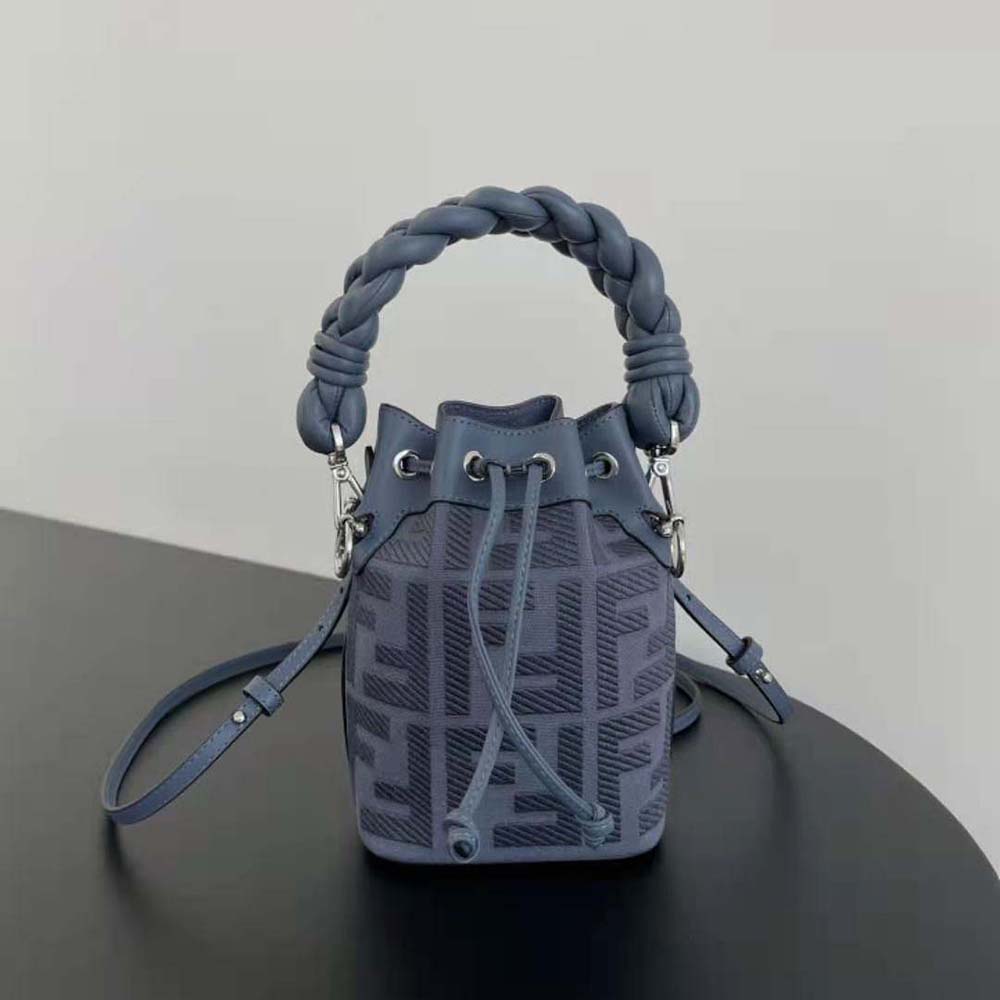 Close-up of gold-tone FF logo charm on Fendi mini-bag