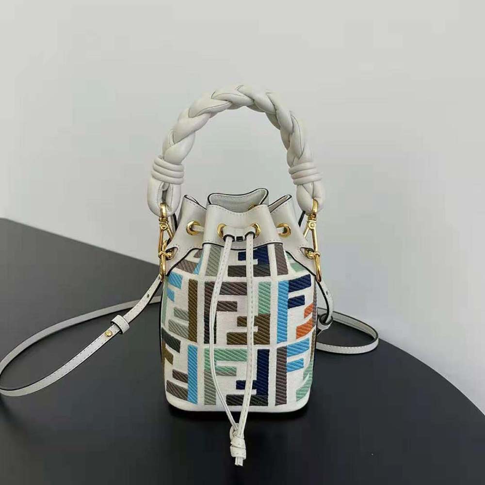 Close-up of multicolor FF embroidery on Fendi Women Mon Tresor white canvas mini-bag