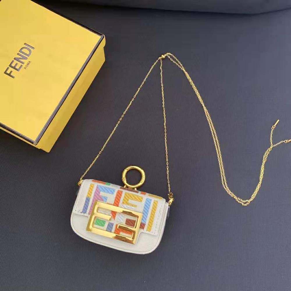 Side angle showing gold-tone hardware on Fendi Women Nano Baguette Charm