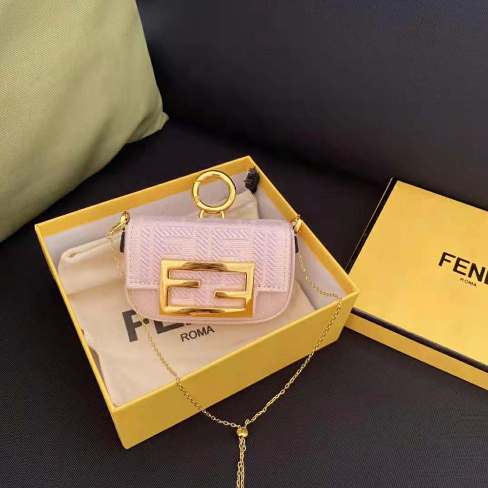 Close-up detail of pink canvas and silver hardware on Fendi Women Nano Baguette Charm