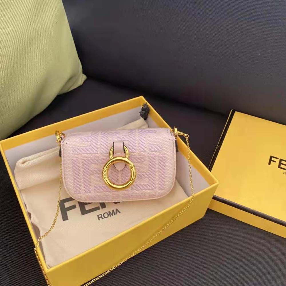 Side angle showing compact size of Fendi Women Nano Baguette Charm Pink Canvas Charm