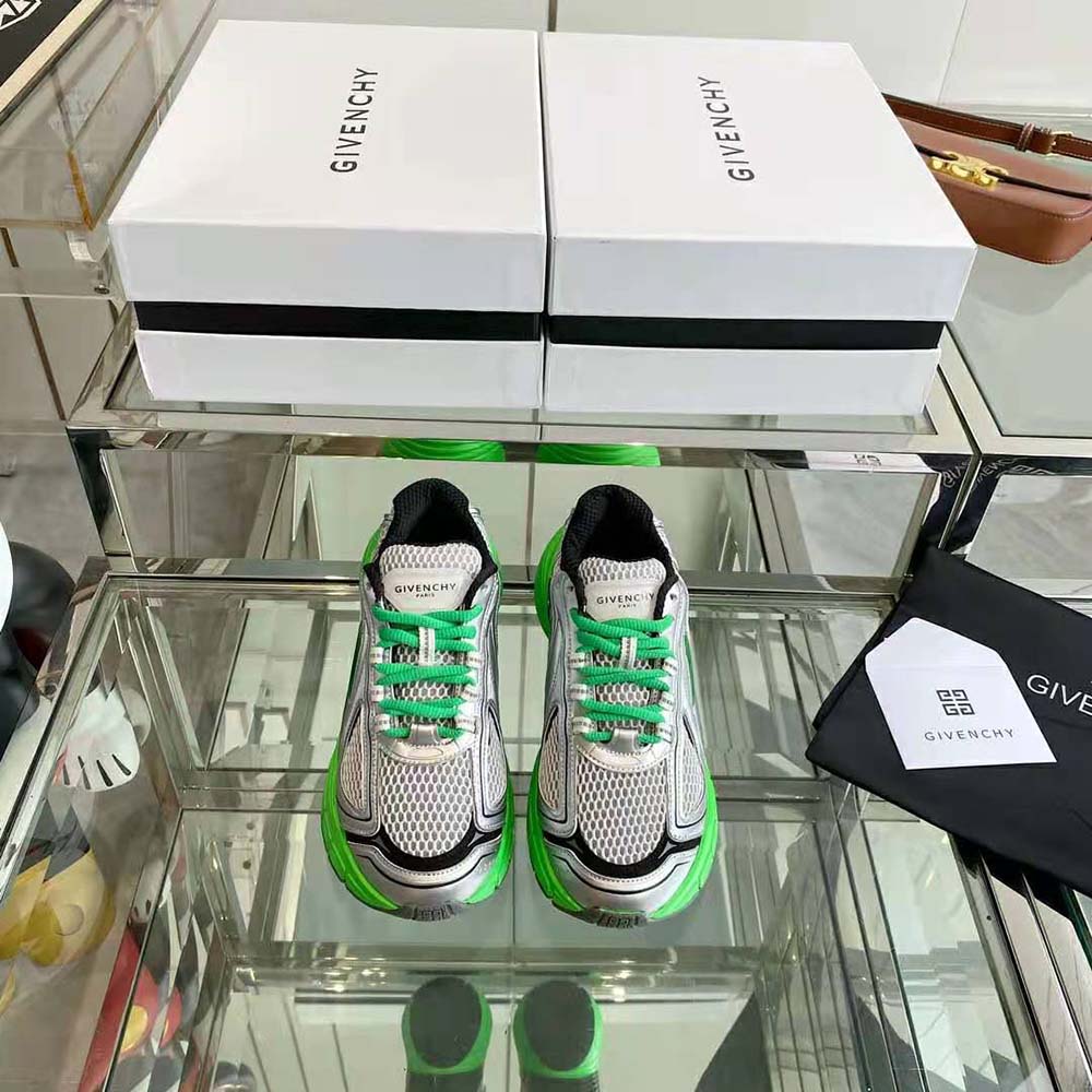 Close-up detail of mesh texture and Givenchy logo on TK-MX Runner Sneakers