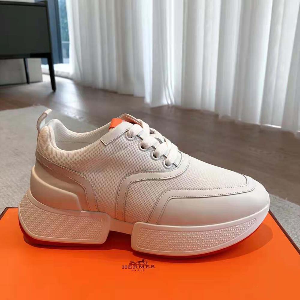 Top view showing low-top silhouette of Hermes Unisex Giga Sneaker in white