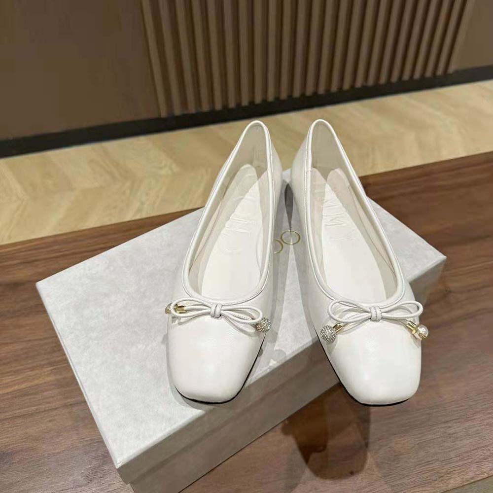 Close-up of pearl embellishment on Jimmy Choo Women Elme Flat Latte Nappa Leather Flats