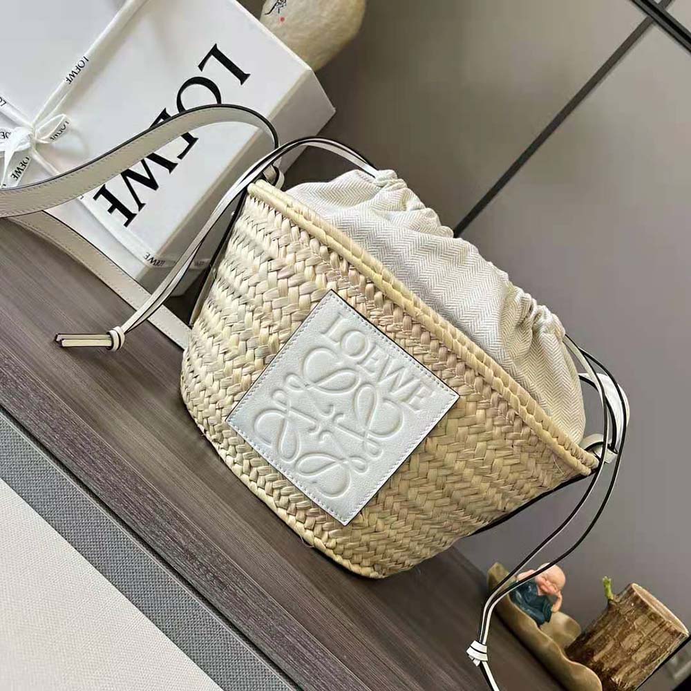 Close-up detail of white calfskin and silver hardware on Loewe bucket bag