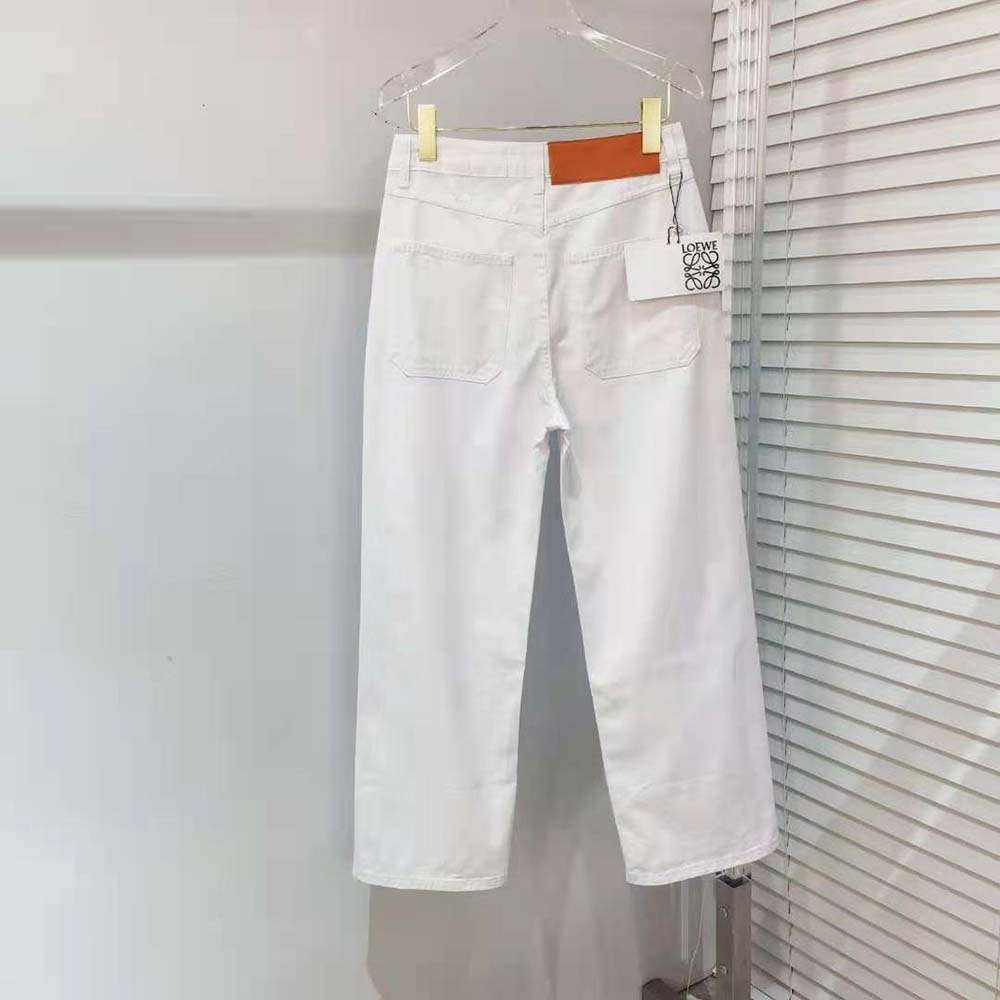 Side profile showing relaxed fisherman silhouette of Loewe Women Fisherman Turn up Jeans