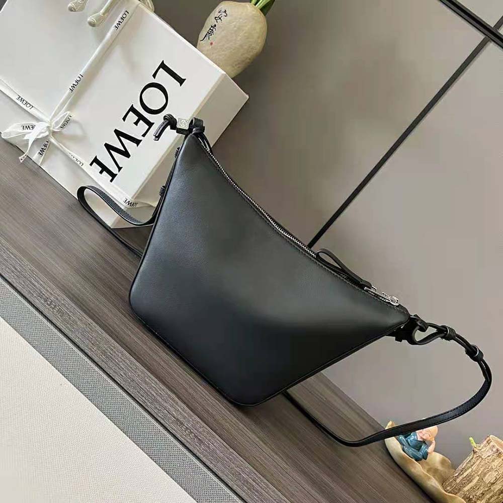 Side profile highlighting the compact silhouette of Loewe Mini Hammock bag