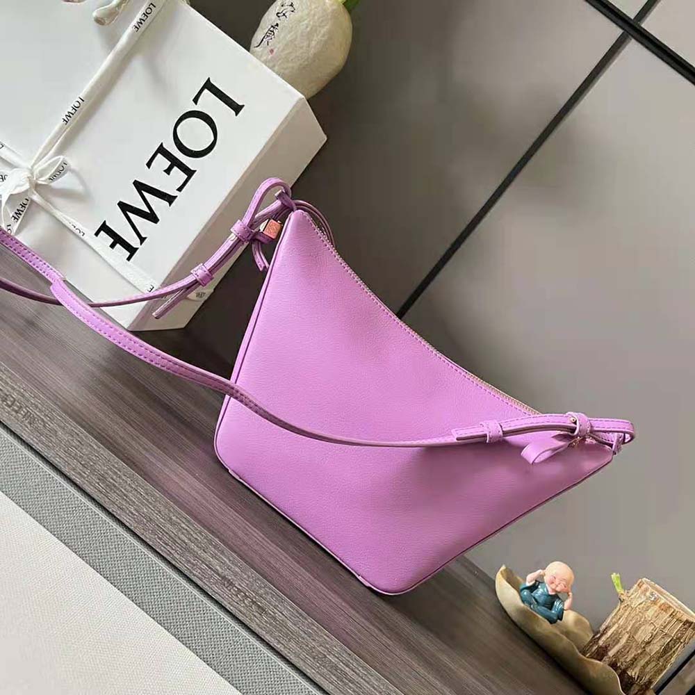 Side angle showing compact silhouette of Loewe Women Mini Hammock Hobo Bag Rose