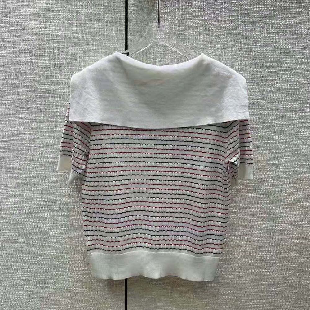 Side angle showing relaxed fit of pink Miu Miu Women Cotton Sweater