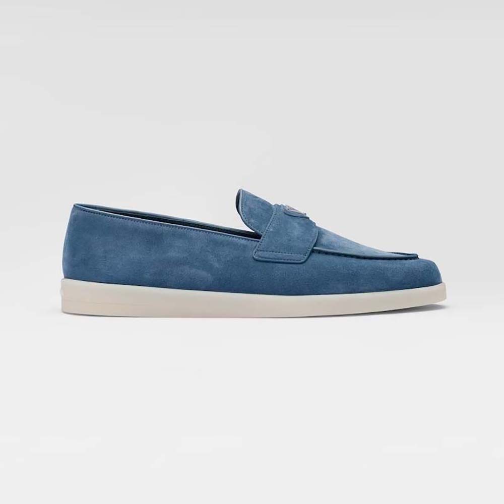 Side angle of Prada Men Suede Loafers with Enameled Triangle Logo in blue suede