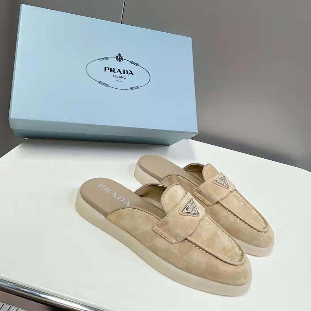Top-down angle showing slip-on silhouette of Prada Unisex Brown Suede Leather Sabots