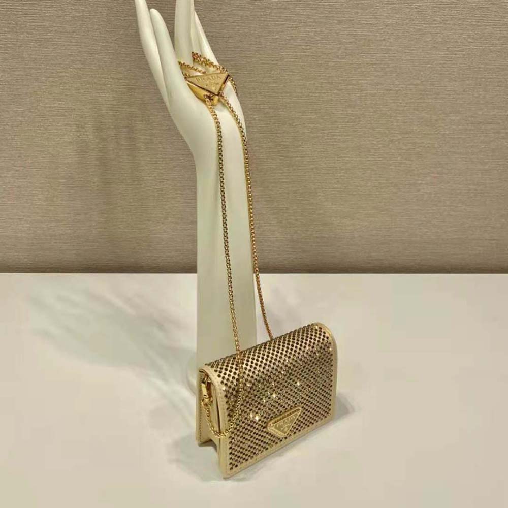 Side angle showing leather shoulder strap of Prada Women Cardholder Gold