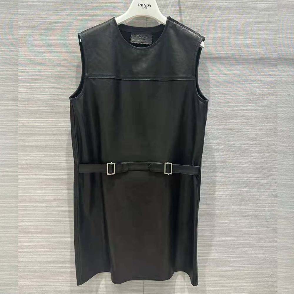 Close-up on knit triangle logo detail of Prada Women Leather Dress