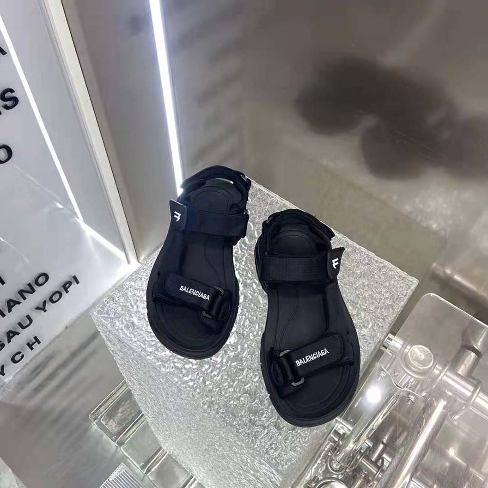 Top angle showing embossed Balenciaga branding on Tourist Sandal