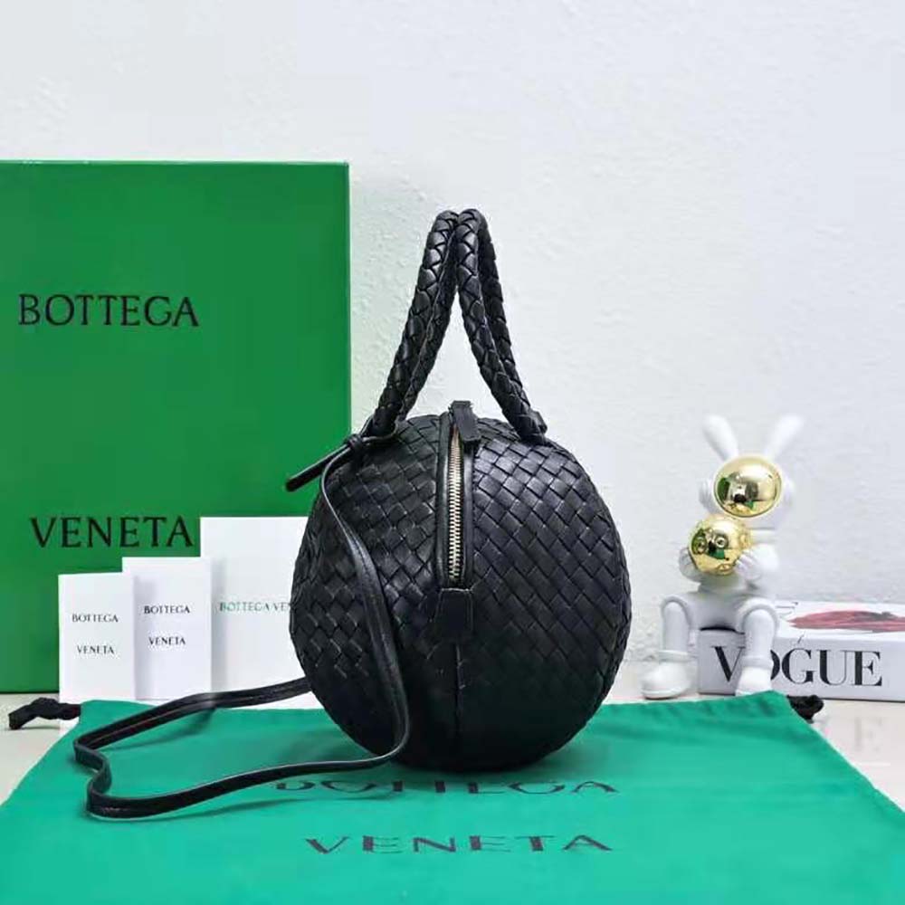 Side angle highlighting structured silhouette of Bottega Veneta Women Mava Top Handle Bag-Black