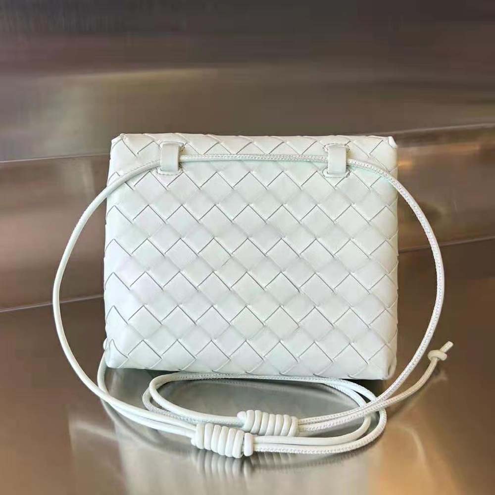 Side angle showing adjustable strap and silver hardware on Bottega Veneta bag