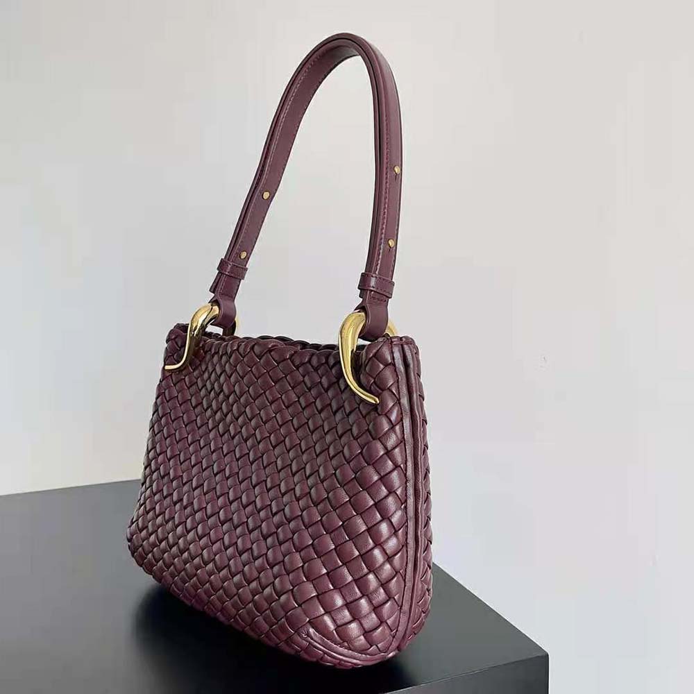 Side profile showcasing adjustable strap on Bottega Veneta Small Clicker Shoulder Bag