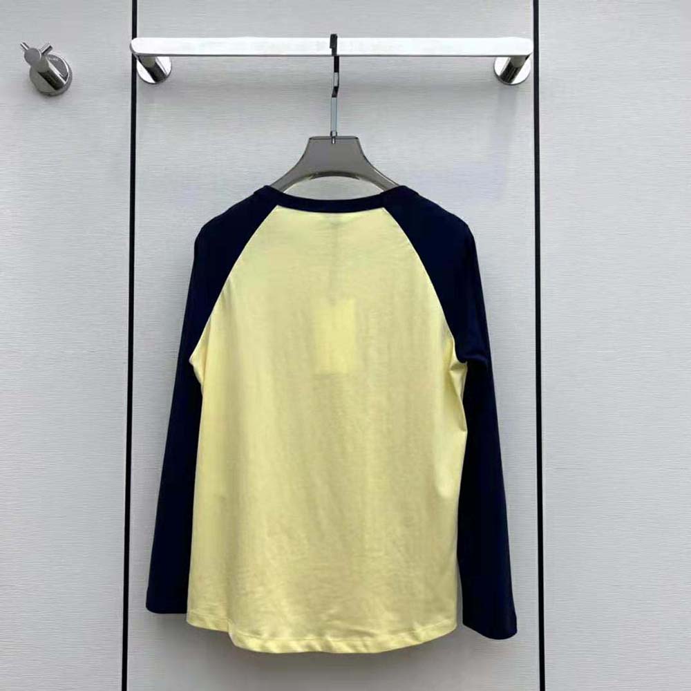 Side profile showing relaxed fit of Celine Women 70s California T-shirt