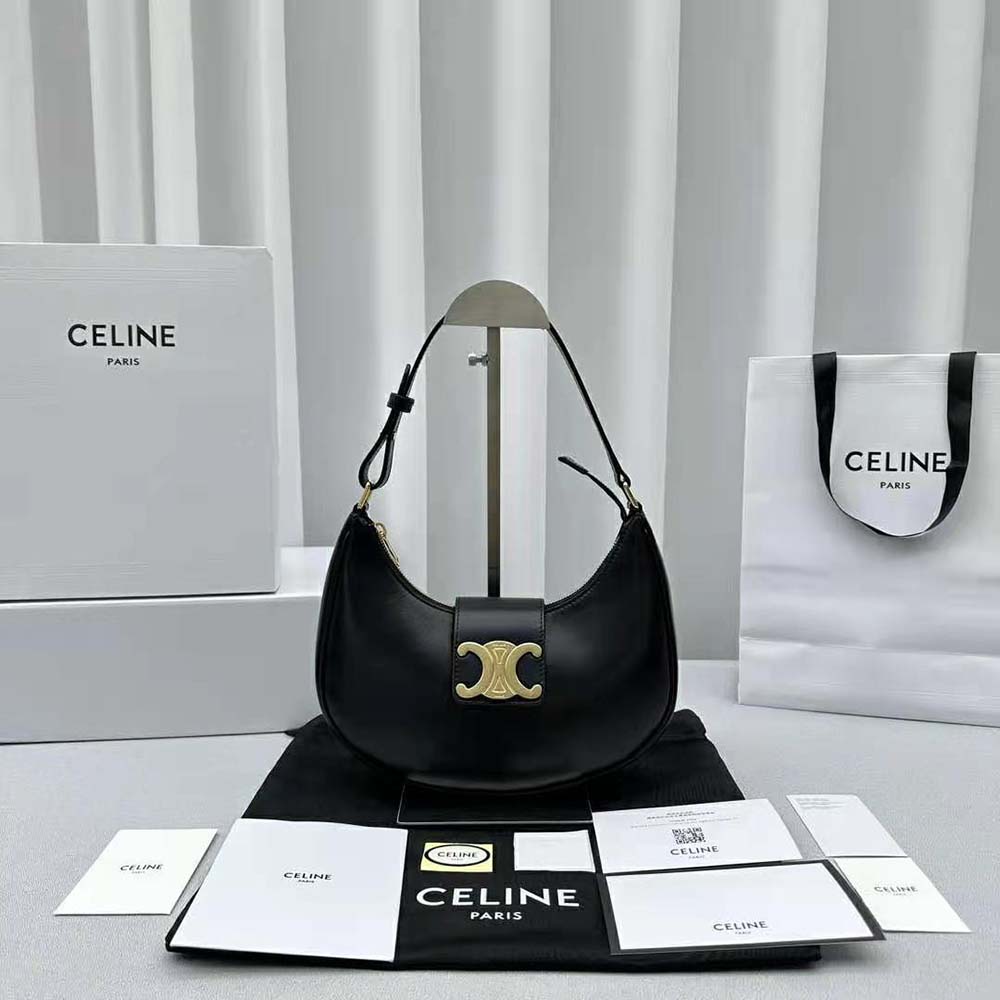 Close-up of gold Triomphe clasp on Celine Women Ava Triomphe Soft Bag