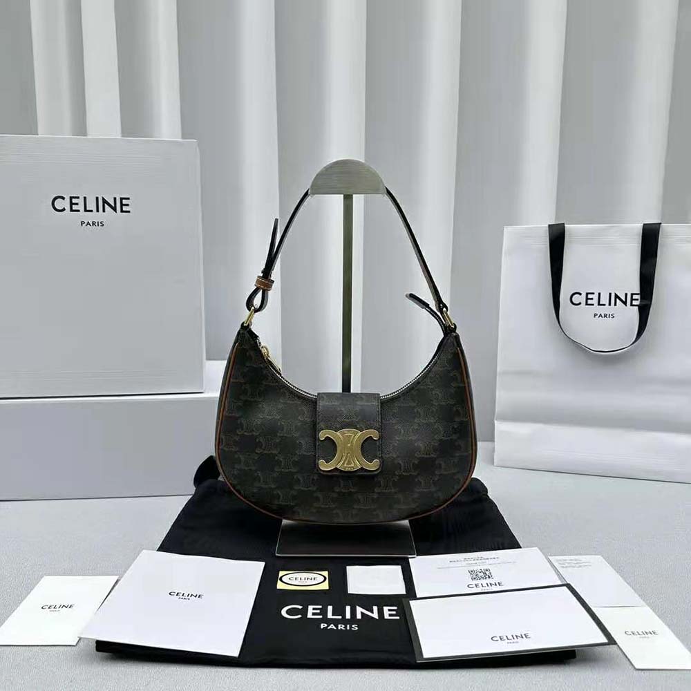 Close-up of gold Triomphe clasp on Celine Women Ava Triomphe Soft Bag