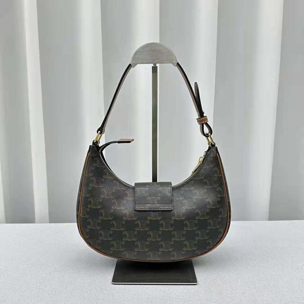 Side angle showing soft silhouette of Celine Women Ava Triomphe Soft Bag