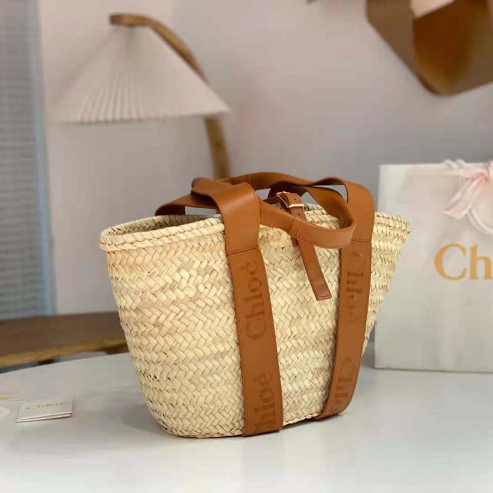 Side angle showing strap and structured silhouette of Chloe Medium Basket