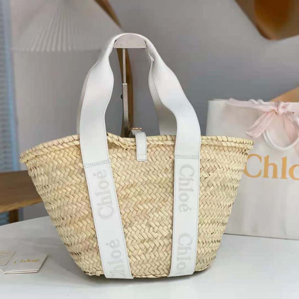 Close-up of braided handle and gold hardware on Chloe Women Sense Medium Basket-White