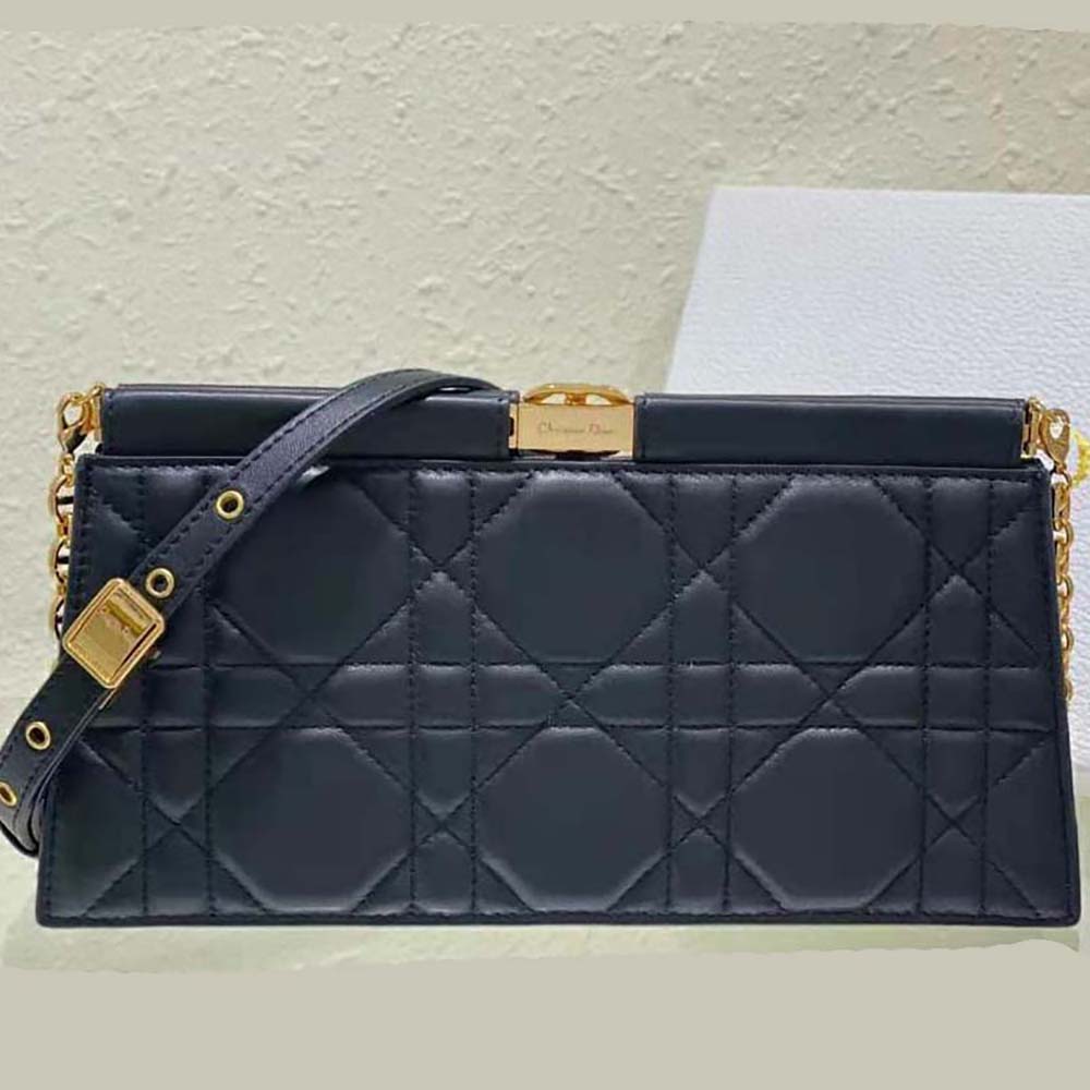 Side angle of Dior Women Dior Caro Colle Noire Clutch showcasing slim profile