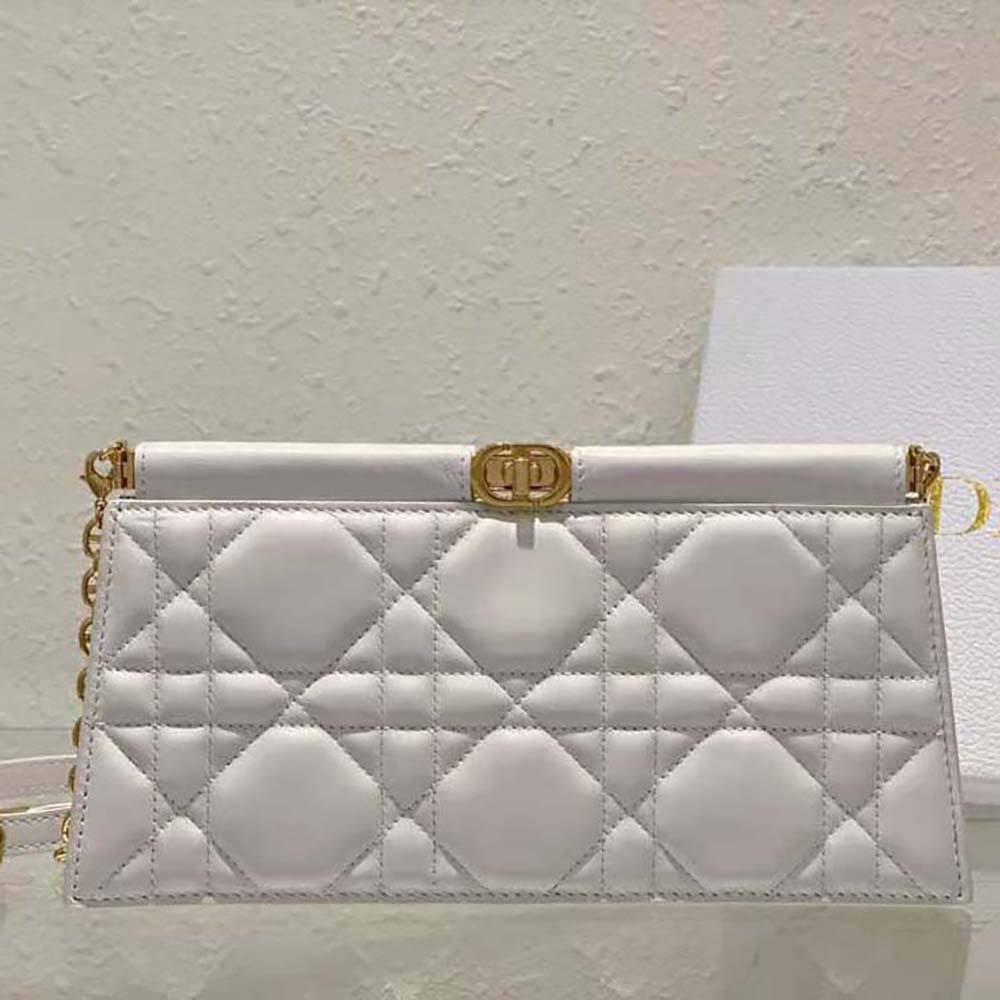 Close-up detail of white lambskin and Cannage quilting on Dior clutch