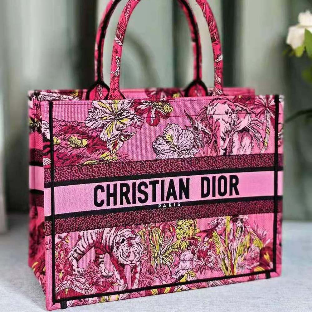 Side angle showing the silhouette of Dior Women Medium Dior Book Tote Fuchsia Multicolor Toile de Jouy