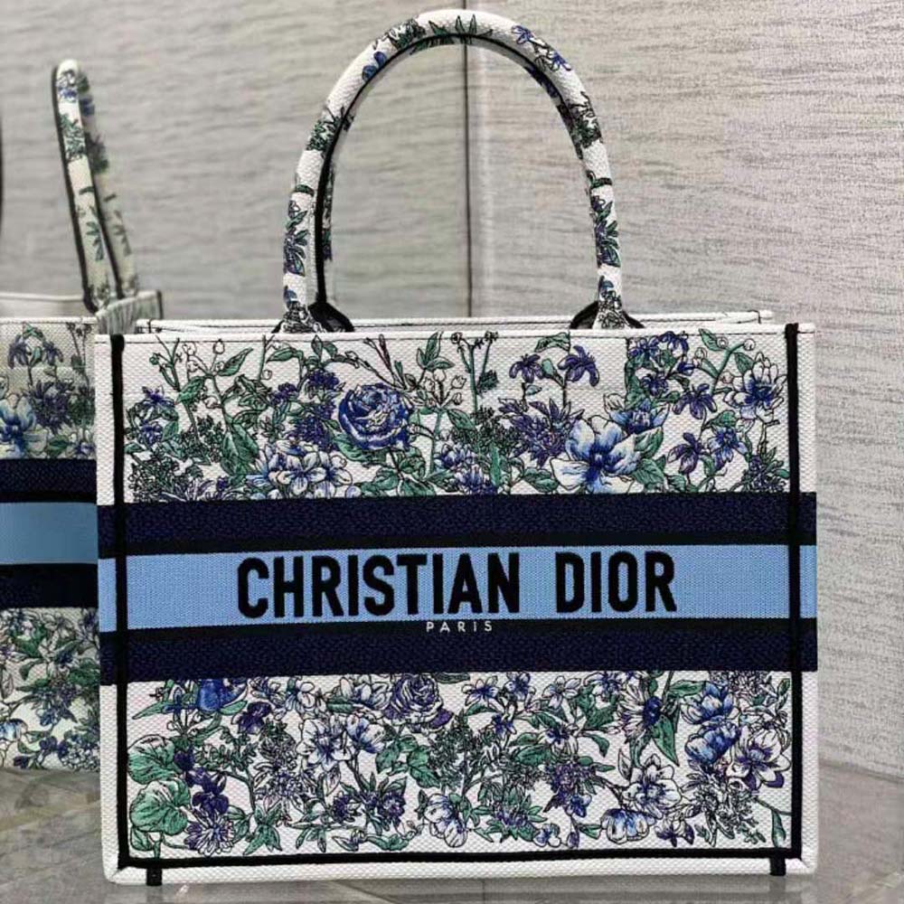 Close-up of floral and constellation embroidery on Dior Book Tote