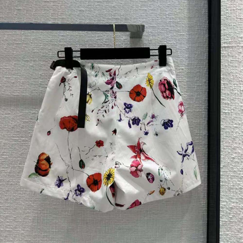 Close-up of red multicolor Florilegio motif on Dior Women Skort white fabric