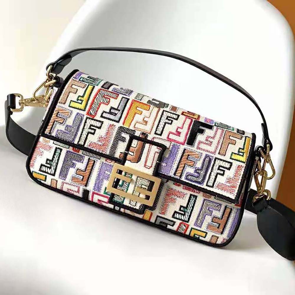 Close-up on gold-tone clasp of Fendi Women Baguette Chinese Valentine’s Day Limited Edition Bag