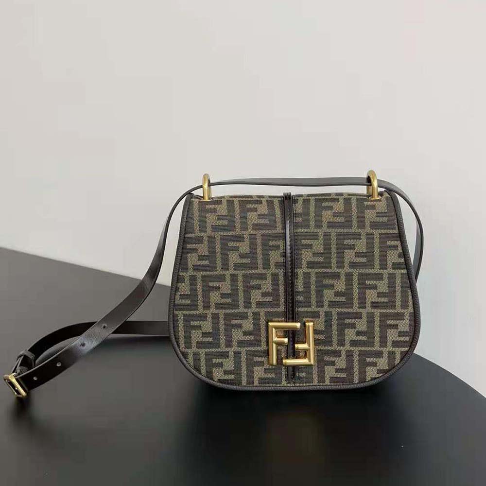 Close-up of gold FF hardware on Fendi Women C’mon Medium Brown bag
