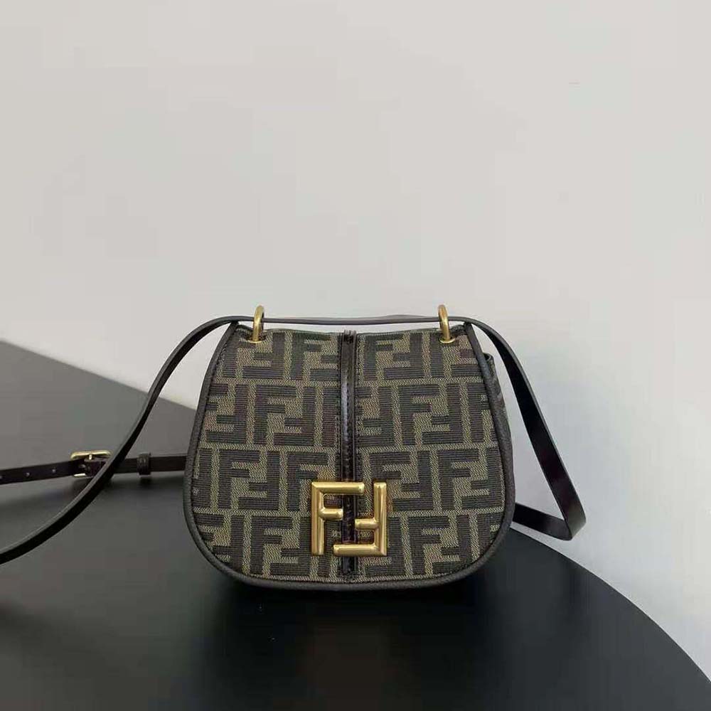 Close-up of gold hardware on Fendi Women C’mon Small Brown FF Bag