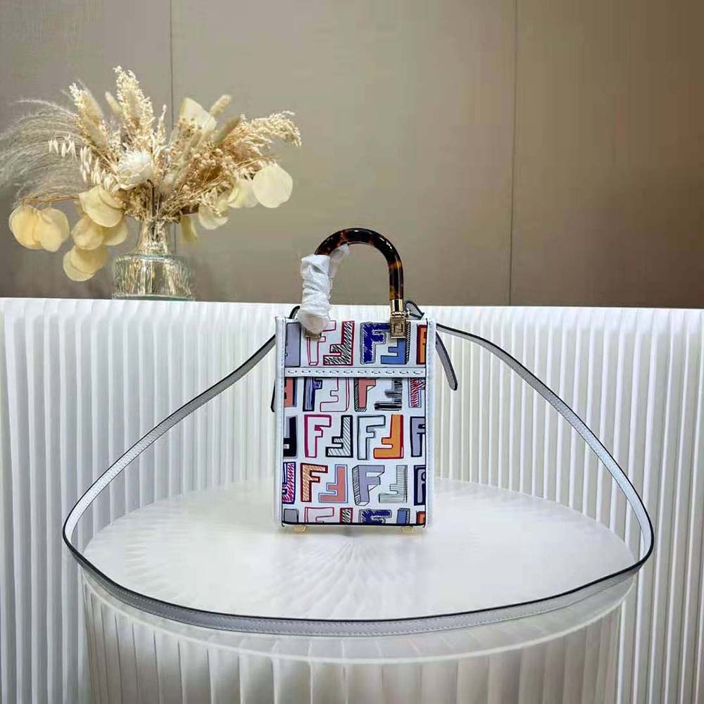 Close-up of gold-tone hardware on Fendi Women Mini Sunshine Shopper mini-bag