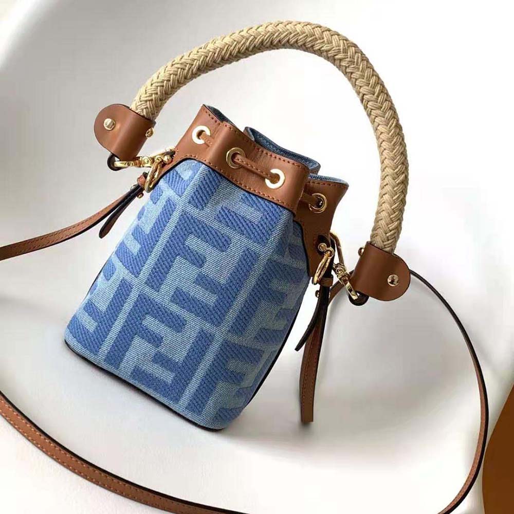 Close-up detail of FF embroidery and silver-tone hardware on mini-bag