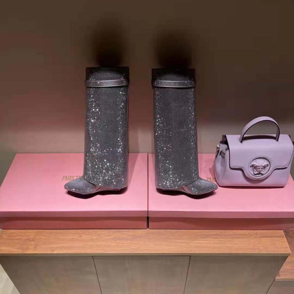 Front angle showing silver satin and Strass details on Givenchy boots
