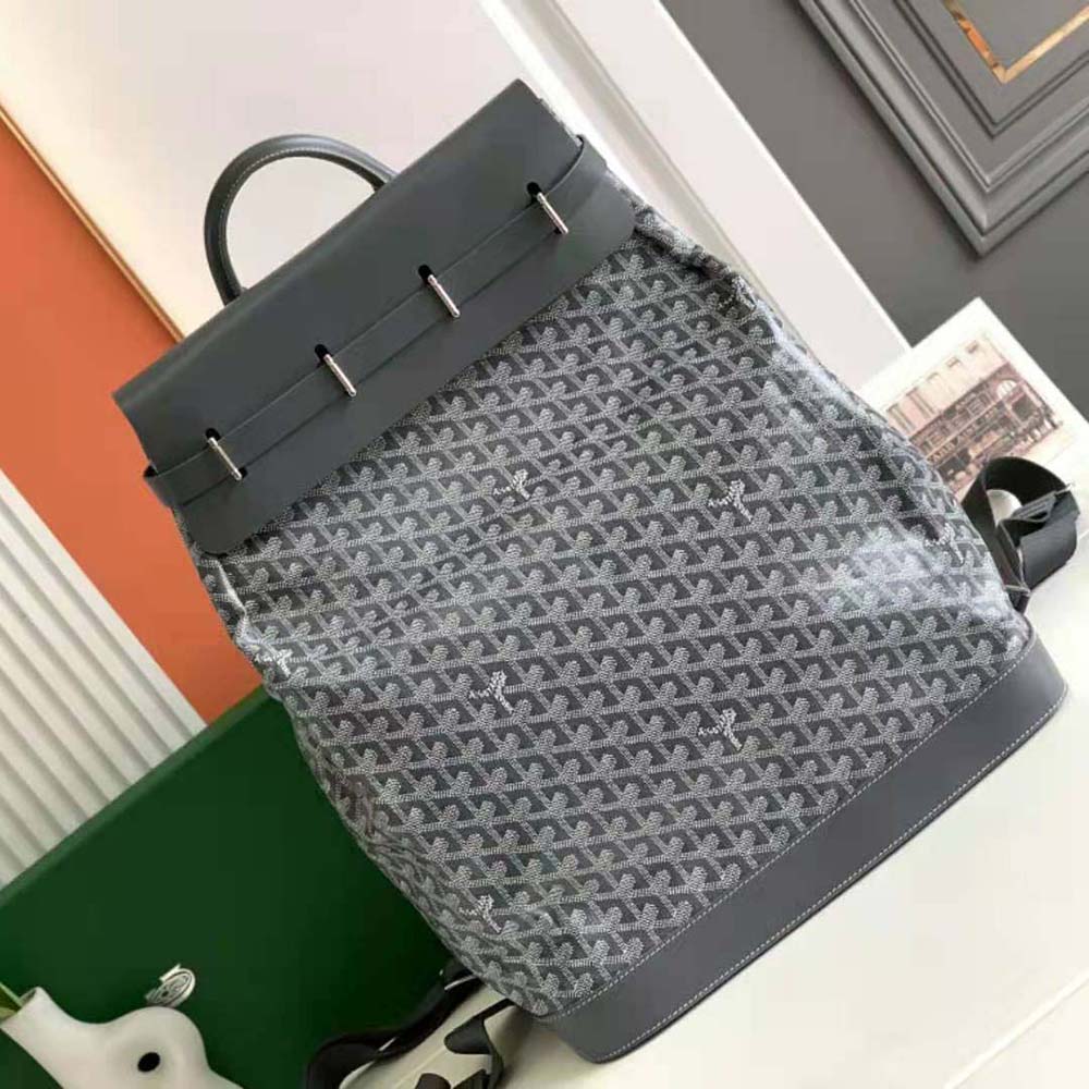 Close-up detail of silver half-circle studs on Goyard Steamer PM bag