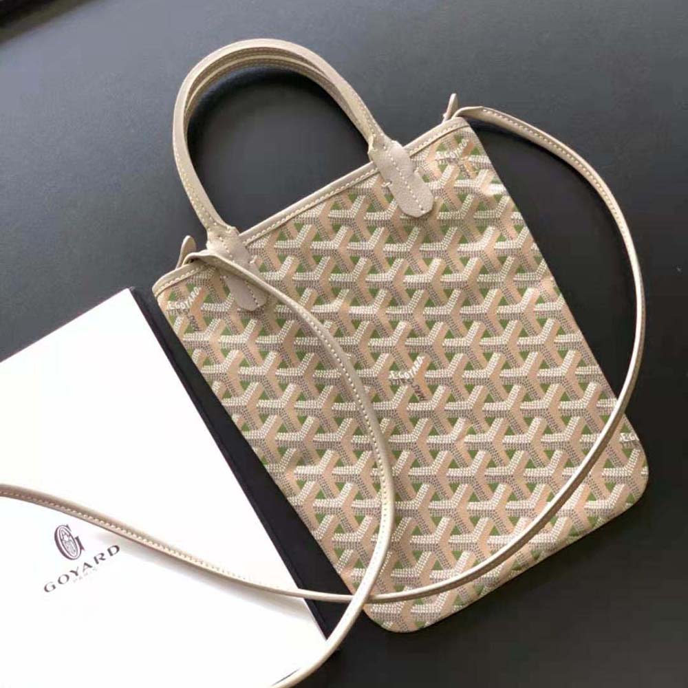 Close-up detail of green Goyardine canvas and leather trim on Poitiers Claire-voie Bag