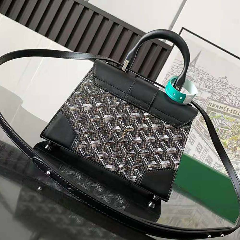Side profile showing structured silhouette of Goyard Women Saïgon Mini Bag