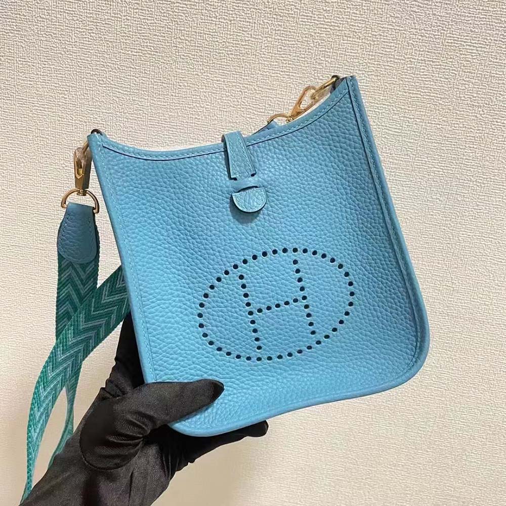 Close-up of perforated 'H' signature on Hermes Evelyne III 16 Mini bag