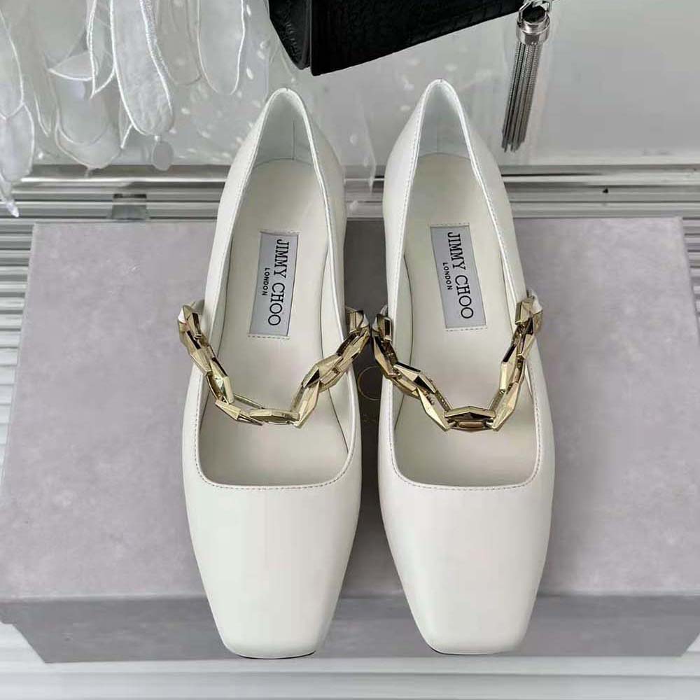 Close-up on silver chain detail of Jimmy Choo Diamond Tilda White flats