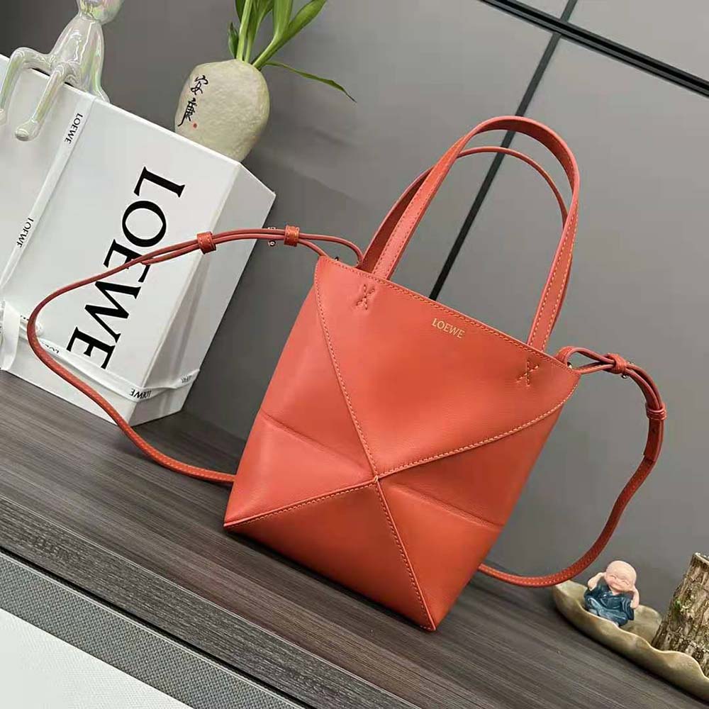 Close-up of Loewe signature puzzle stitching and silver hardware detail