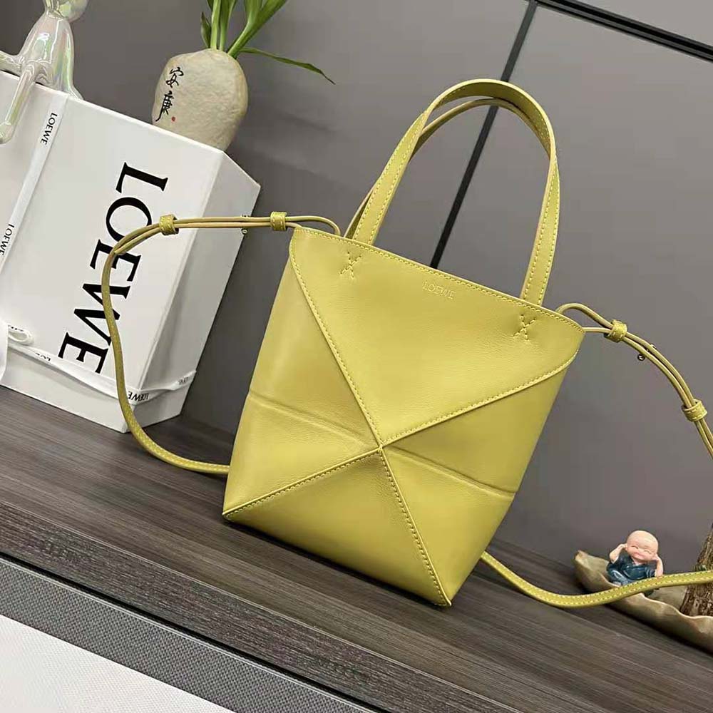 Close-up of gold-tone hardware on Loewe Unisex Mini Puzzle Fold Tote