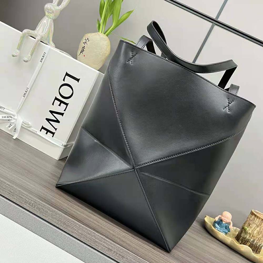 Side angle showing foldable design of Loewe Unisex Puzzle Fold Tote