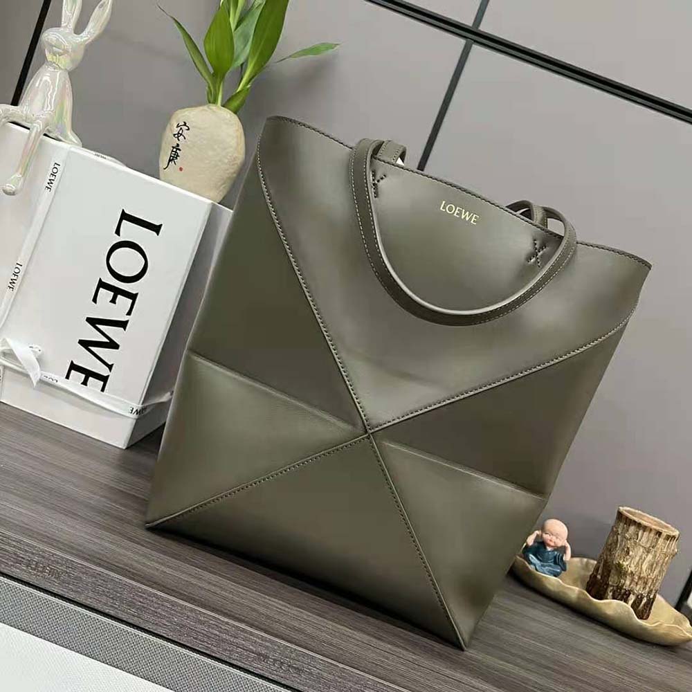 Close-up of foldable geometric detail and silver hardware on Loewe tote