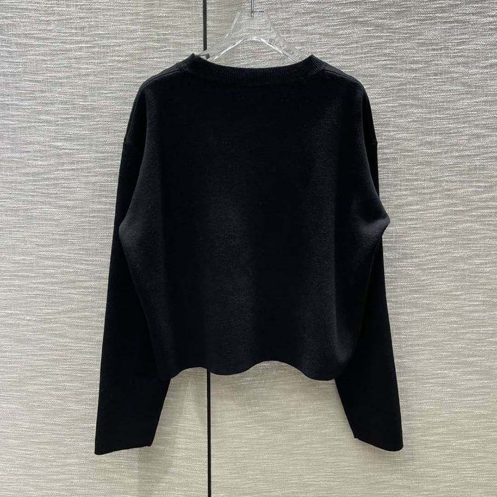 Close-up of embossed Anagram detail on Loewe Wool-Black sweater
